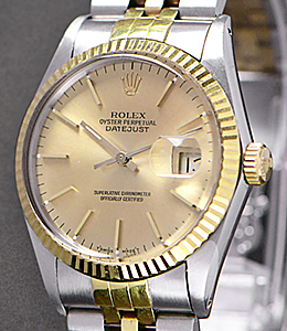 Datejust 36mm in Steel with Yellow Gold Fluted Bezel on Jubilee Bracelet with Champagne Stick Dial