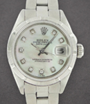 Lady's Datejust - 26mm - Fluted Bezel on Oyster Bracelet with MOP Diamond Dial