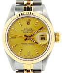 Lady's 2-Tone Datejust in Steel with Yellow Gold Fluted Bezel on Bracelet with Champagne Stick Dial