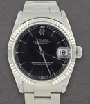 31mm Datejust in Steel with White Gold Fluted Bezel on Oyster Bracelet with Black Stick Dial