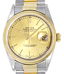 Datejust 36mm in Steel with Yellow Gold Smooth Bezel on Oyster Bracelet with Champagne Index Dial