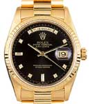 President Day-Date 36mm in Yellow Gold with Fluted Bezel on President Bracelet with Black Diamond Dial