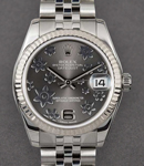 Datejust Mid Size 31mm in Steel with White Gold Fluted Bezel on Jubilee Bracelet with Dark Rhodium Floral Dial