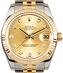 Datejust 31mm in Steel with Yellow Gold Fluted Bezel on Jubilee Bracelet with Champagne Diamond Dial