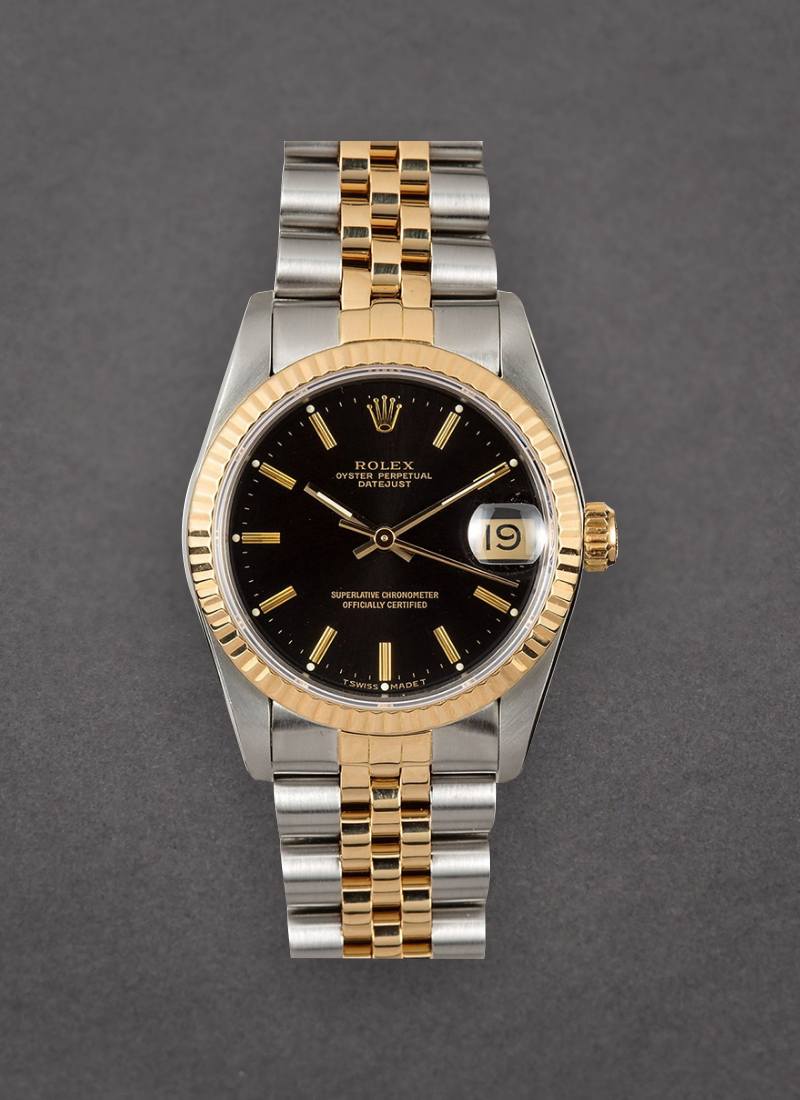 Pre-Owned Rolex 2-Tone Mid Size Datejust 31mm in Steel with Yellow Gold Fluted Bezel