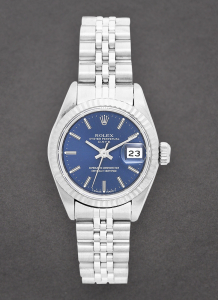 Pre-Owned Rolex 69240 Date Lady's 26mm in Steel with Whie Gold Fluted Bezel 69240