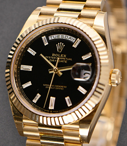 Preident Day Date 40mm in Yellow Gold Black Dial with Baguette Markers