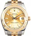 Datejust 31mm Mid Size in Steel with Yellow Gold Fluted Bezel on Jubilee Bracelet with Champagne Index Dial