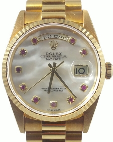 Day Date 36mm President in Yellow Gold with Fluted Bezel  on President Bracelet with Mother of Pearl Ruby Diamond Dial