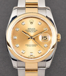 Datejust 36mm in Steel with Yellow Gold Smooth Bezel on Oyster Bracelet with Champagne Diamond Dial