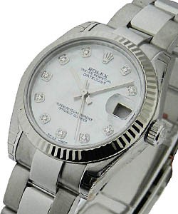 Datejust Midsize 31mm in Steel with White Gold Fluted Bezel On Oyster Bracelet with White MOP Diamond Dial