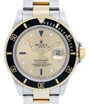 Submariner in Steel with Yellow Gold With Black Bezel on Oyster Bracelet With Champagne Serti Dial with Diamond Hour Markers