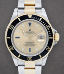 Submariner in Steel with Yellow Gold With Black Bezel on Oyster Bracelet With Champagne Serti Dial with Diamond Hour Markers