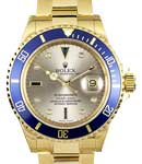 Submariner 40mm in Yellow Gold with Blue Bezel on Oyster Bracelet with Silver Serti Diamond Dial