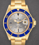 Submariner 40mm in Yellow Gold with Blue Bezel on Oyster Bracelet with Silver Serti Diamond Dial