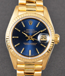 President in Yellow Gold with Fluted Bezel on President Bracelet with Blue Stick Dial