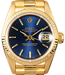 President in Yellow Gold with Fluted Bezel on President Bracelet with Blue Stick Dial