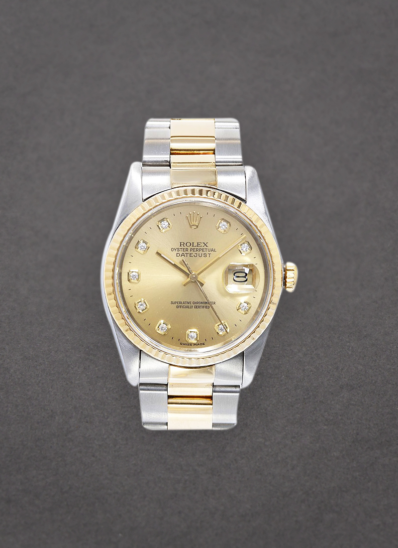 Pre-Owned Rolex Datejust 36mm in Steel with Yellow Gold Fluted Bezel