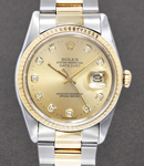 Datejust 36mm in Steel with Yellow Gold Fluted Bezel on Oyster Bracelet with Champagne Diamond Dial