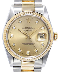 Datejust 36mm in Steel with Yellow Gold Fluted Bezel on Oyster Bracelet with Champagne Diamond Dial