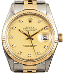Datejust 36mm in Steel with Yellow Gold Fluted Bezel on Jubilee Bracelet with Champagne Diamond Dial