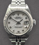 Lady's Datejust 26mm in Steel with White Gold Fluted Bezel on Jubilee Bracelet with White MOP Arabic Dial