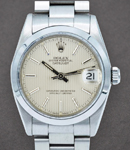 Datejust 31mm in Steel with Domed Bezel on Steel Oyster Bracelet with Silver Tapestry Stick Dial