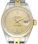 Datejust 26mm lady's in Steel with Yellow Gold Fluted Bezel on Jubilee Bracelet with Champagne Tapestry Dial