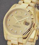 Midsize 31mm President in Yellow Gold with Fluted Bezel on President Bracelet with Champagne Diamond Dial