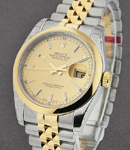 Datejust 36mm in Steel with Yellow Gold Domed Bezel on Jubilee Bracelet with Champagne Stick Dial