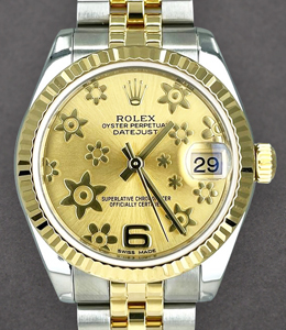 Datejust 31mm in Steel with Yellow Gold Fluted Bezel  on Jubilee Bracelet with Champagne Flora Dial
