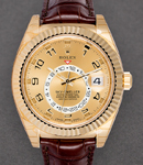 Sky Dweller in Yellow Gold with Fluted Bezel on Strap with Champagne Arabic Dial