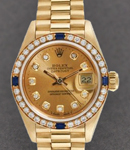 Ladies President in Yellow Gold with Ruby Diamond Bezel on President Bracelet with Champagne Diamond Dial