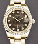 Mid Size Datejust 31mm in Yellow Gold with Diamond Bezel on Oyster Bracelet with Black MOP Diamond Dial