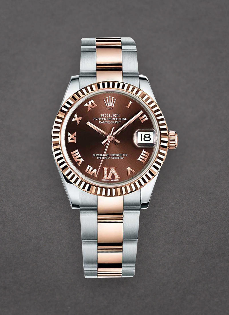 Pre-Owned Rolex Datejust 31mm Mid Size in Steel with Rose Gold Fluted Bezel