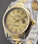 Datejust 36mm in Steel with Yellow Gold Fluted Bezel on Jubilee Bracelet with Champagne Stick Dial