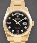 Day Date President in Yellow Gold with Domed Bezel on Oyster Bracelet with Black Diamond Dial with Ruby 6 & 9