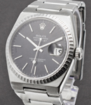 Quartz Datejust 36mm in Steel with Fluted Bezel on Steel Quartz Oyster Bracelet with Black Stick Dial