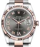 Datejust 36mm in Steel with Rose Gold Fluted Bezel on Oyster Bracelet with Dark Rhodium Roman Dial with Diamond VI & IX