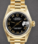 President 26mm in Yellow Gold with Fluted Bezel on President Bracelet with Black Roman Dial