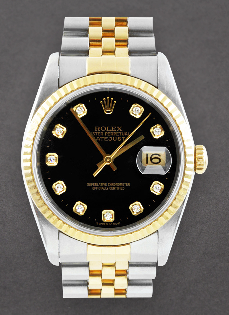 Pre-Owned Rolex Datejust 36mm in Steel with Yellow Gold Fluted Bezel