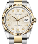 Datejust in Steel with Yellow Gold Fluted Bezel on Oyster Bracelet with Silver Jubilee Diamond Dial