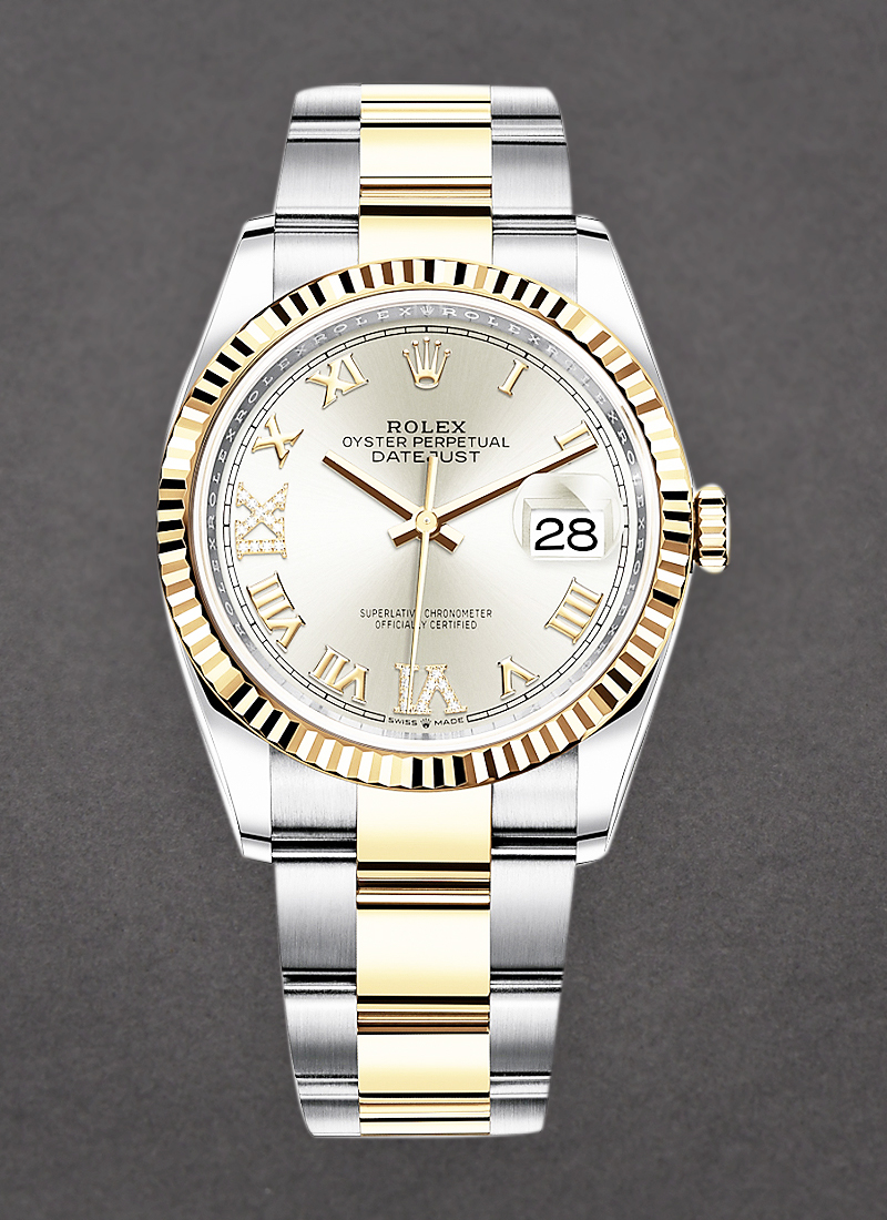 Rolex Unworn 36mm Datejust in Steel with Yellow Gold Fluted Bezel