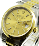 Datejust 36mm in Steel with Yellow Gold Smooth Bezel On Oyster Bracelet with Champagne Stick Dial