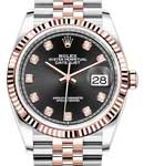Datejust 36mm in Steel with Rose Gold Fluted Bezel on Jubilee Bracelet with Black Diamond Dial