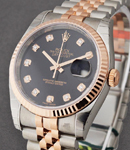 Datejust 36mm in Steel with Rose Gold Fluted Bezel on Jubilee Bracelet with Black Diamond Dial