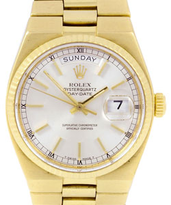 Day-Date President 36mm in Yellow Gold with Fluted Bezel  on Oyster Quartz Bracelet with Silver Stick Dial