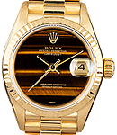 Datejust Lady's 26mm in Yellow Gold with Fluted Bezel on President Bracelet with Tiger Eye Dial