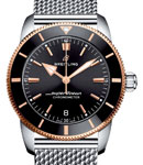 Superocean Heritage II 42mm in Steel with Rose Gold and Black Ceramic Bezel on Stainless Steel Bracelet with Black Dial