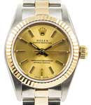 Oyster Perpetual No Date Lady's in Steel with Yellow Gold Fluted Bezel on Oyster Bracelet with Champagne Stick Dial